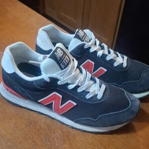 New Balance Men's Black and White Sneakers with Red Accents